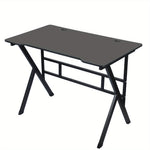 Load image into Gallery viewer, Gaming desk 100cm, angled view showing the black desktop and X-shaped steel legs
